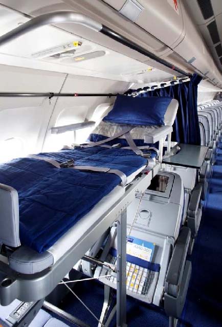 Commercial airline stretcher on plane.